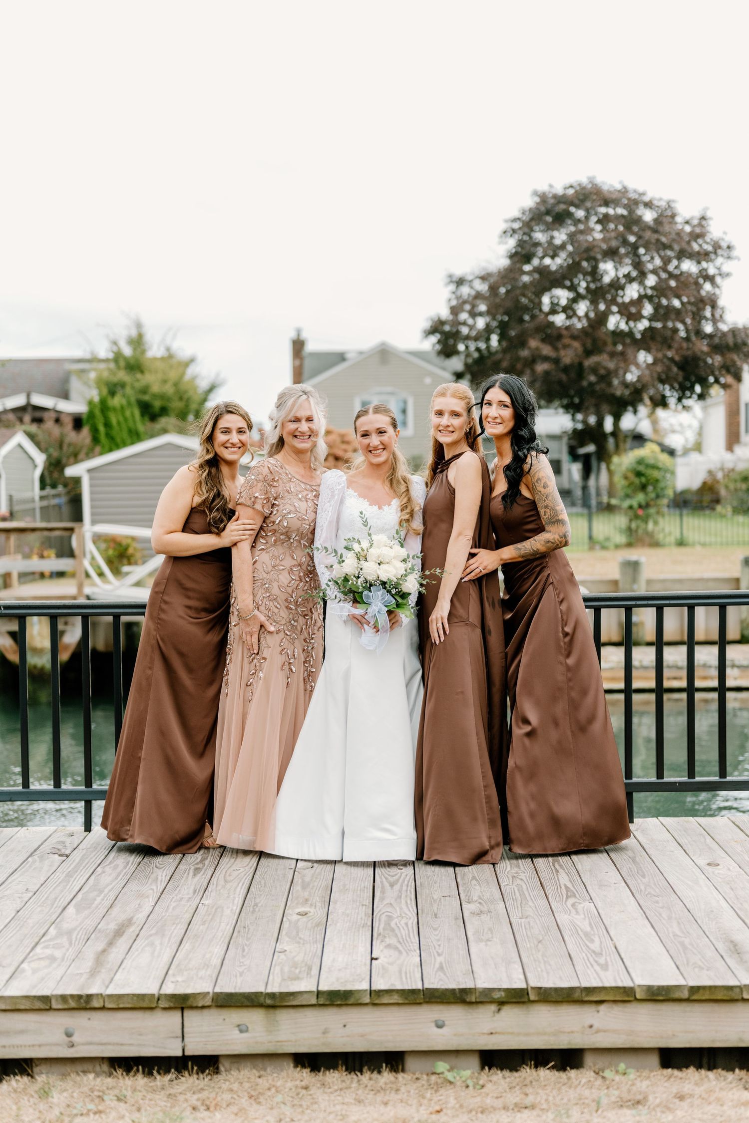 Bride and bridesmaid photo on the water on Long Island, New York