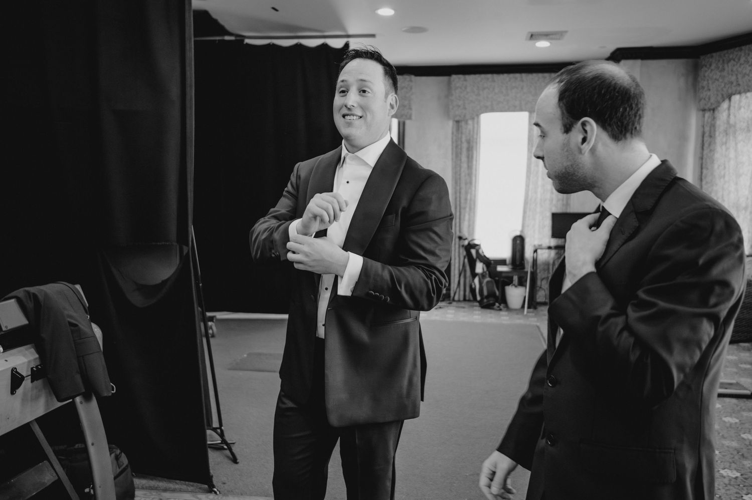 Groom and best man getting ready for wedding on Long Island