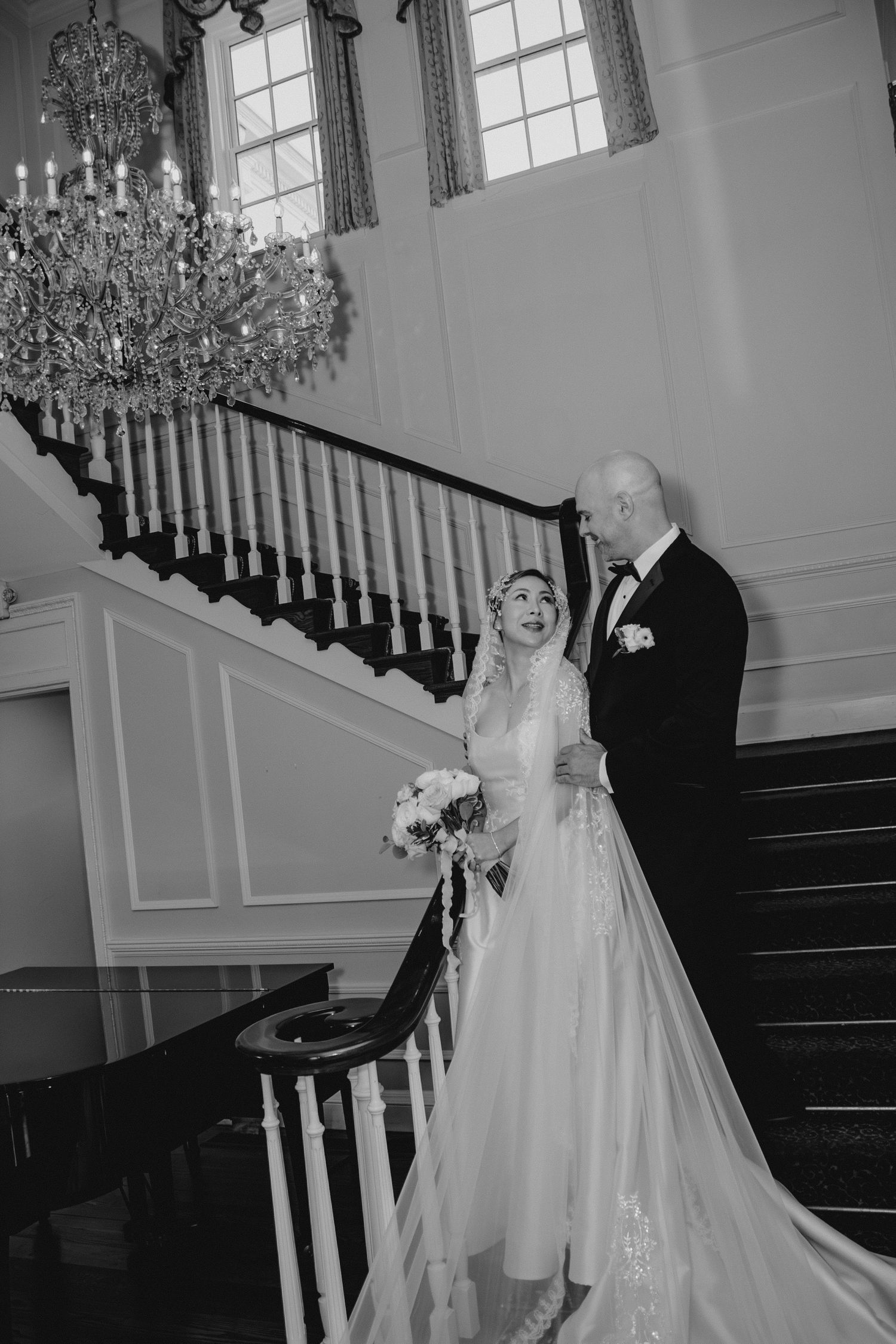 Bride and Groom posing on stairs on Long Island, New York