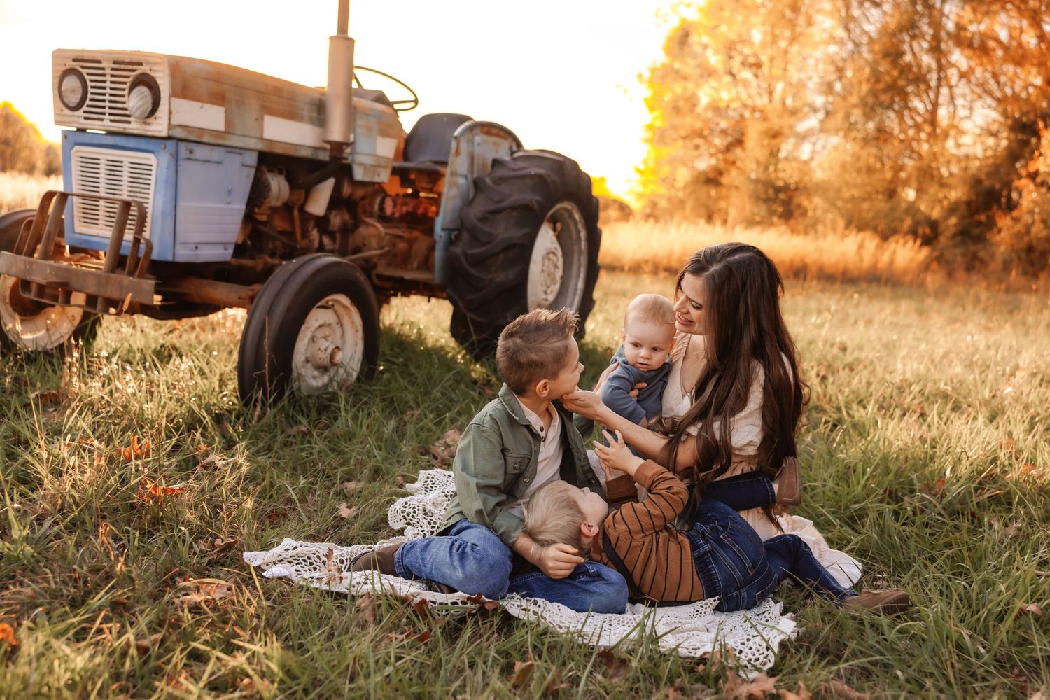 Candid family snuggles with newborn in Lincolnton NC home