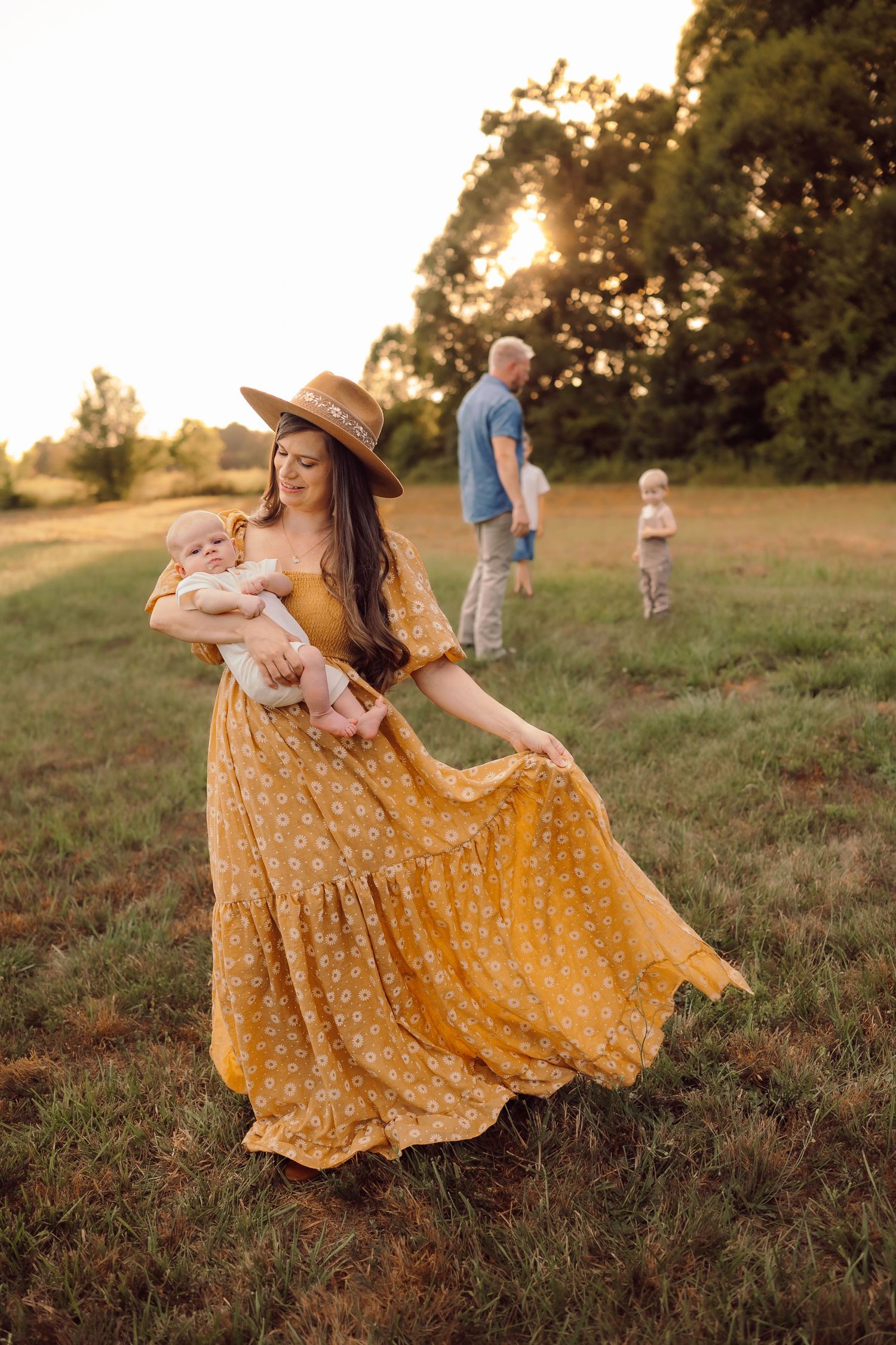 Outdoor family photography session in Lincolnton NC with candid smiles