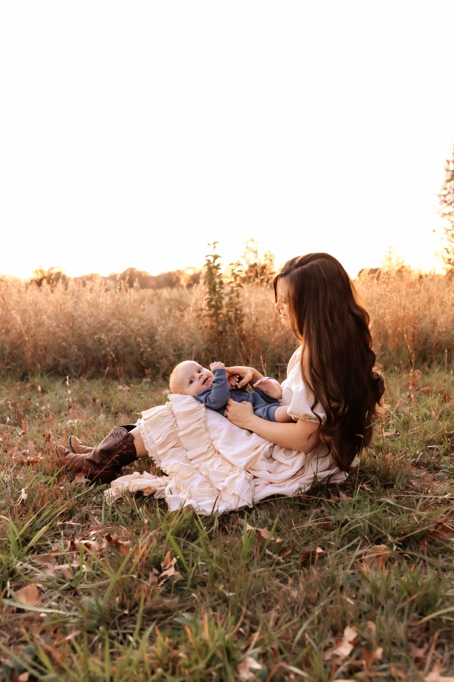 Candid family snuggles with newborn in Hickory NC home