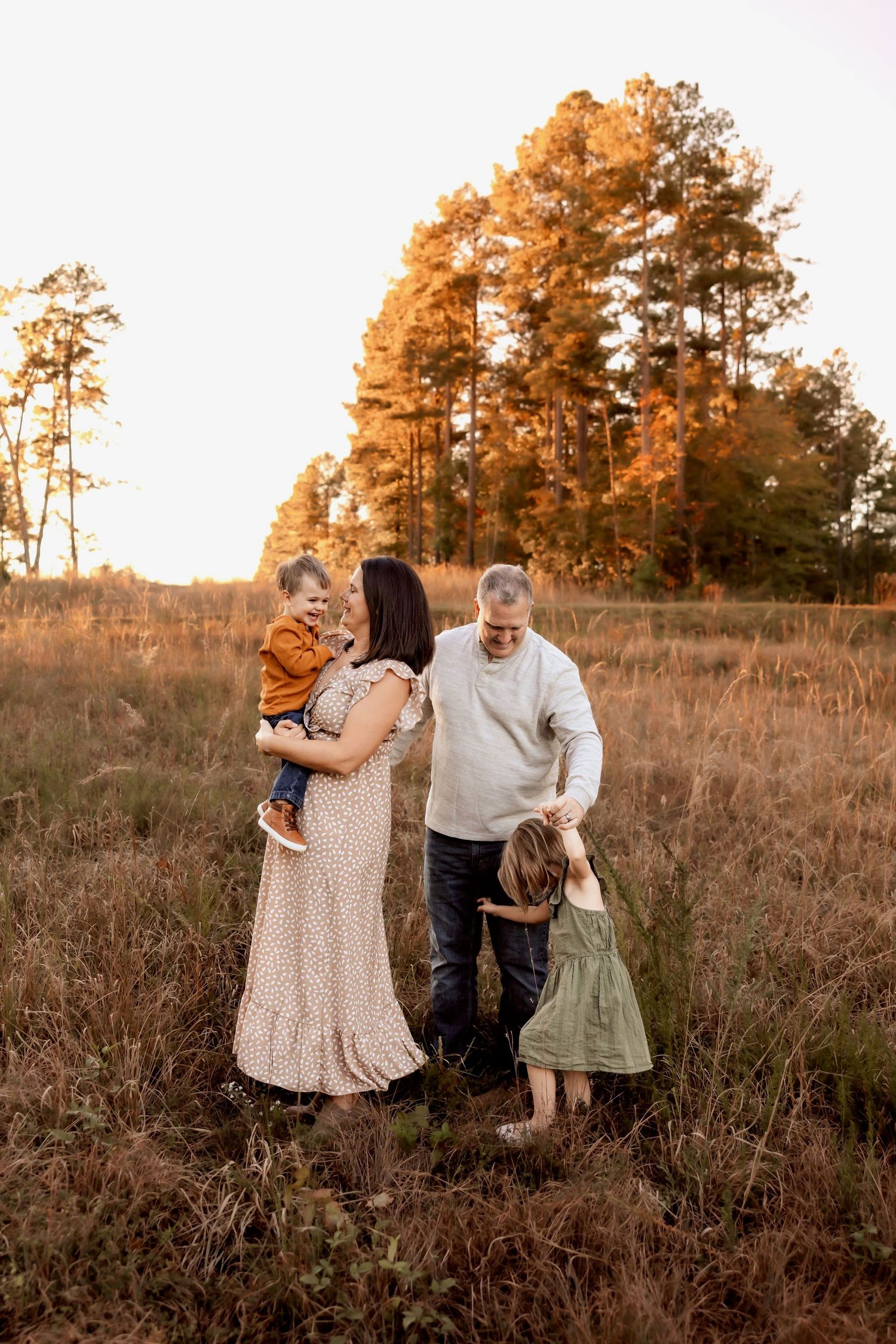 Outdoor family photography session in Lincolnton NC with candid smiles