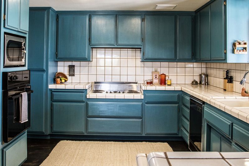 Place branding Image Gatos Trail ranch vintage kitchen white tile turquoise cabinets