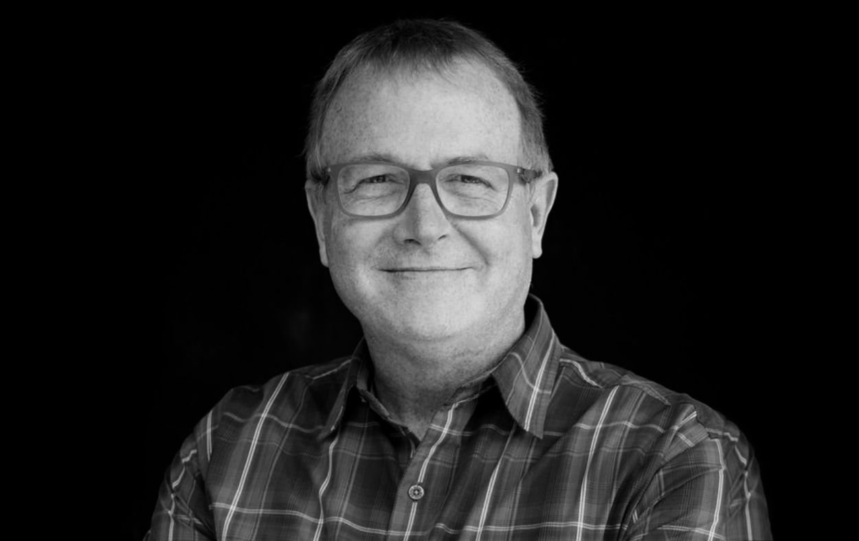Staff Portrait black and white headshot against black backdrop