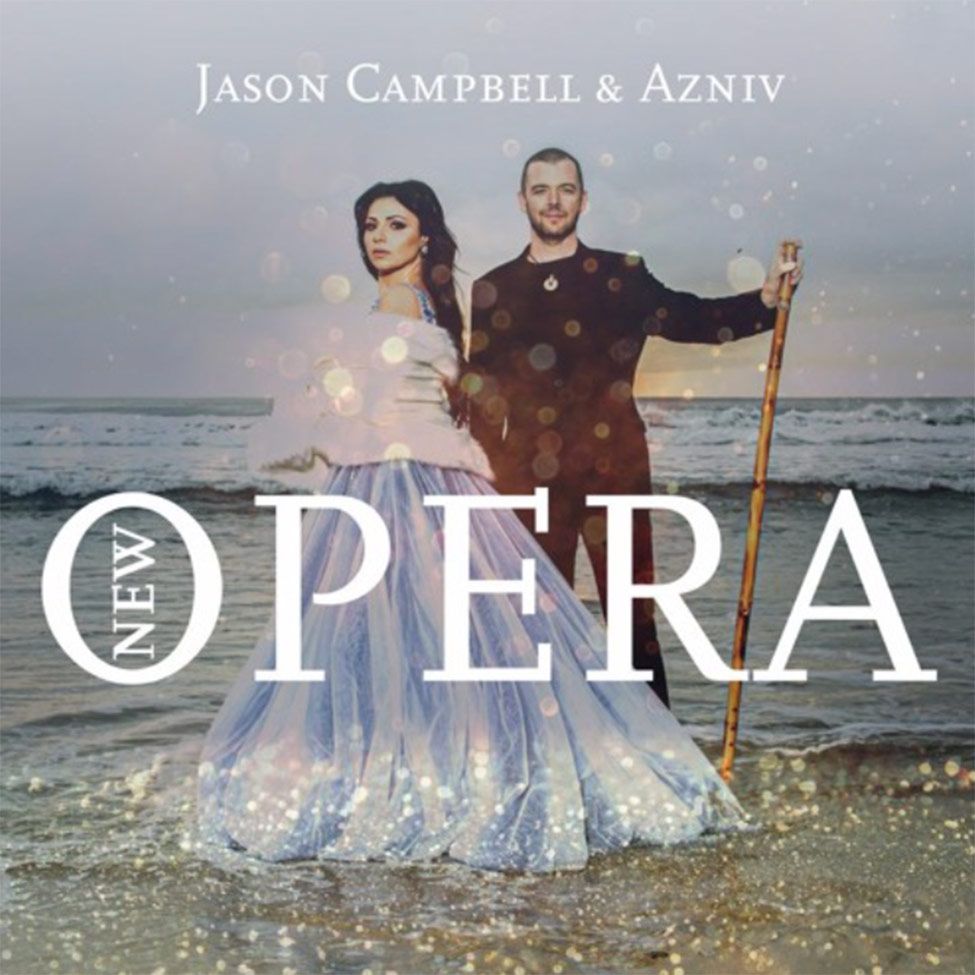 Album Cover New Age Opera Jason Campbell standing in water on beach holding tall wood flute Azniv standing beside him in pale blue ballgown