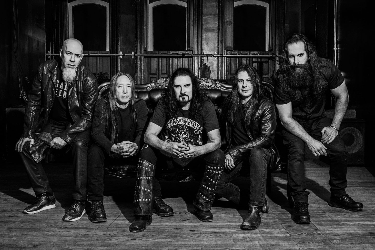 Dream Theater band portrait black and white seated on vintage couch