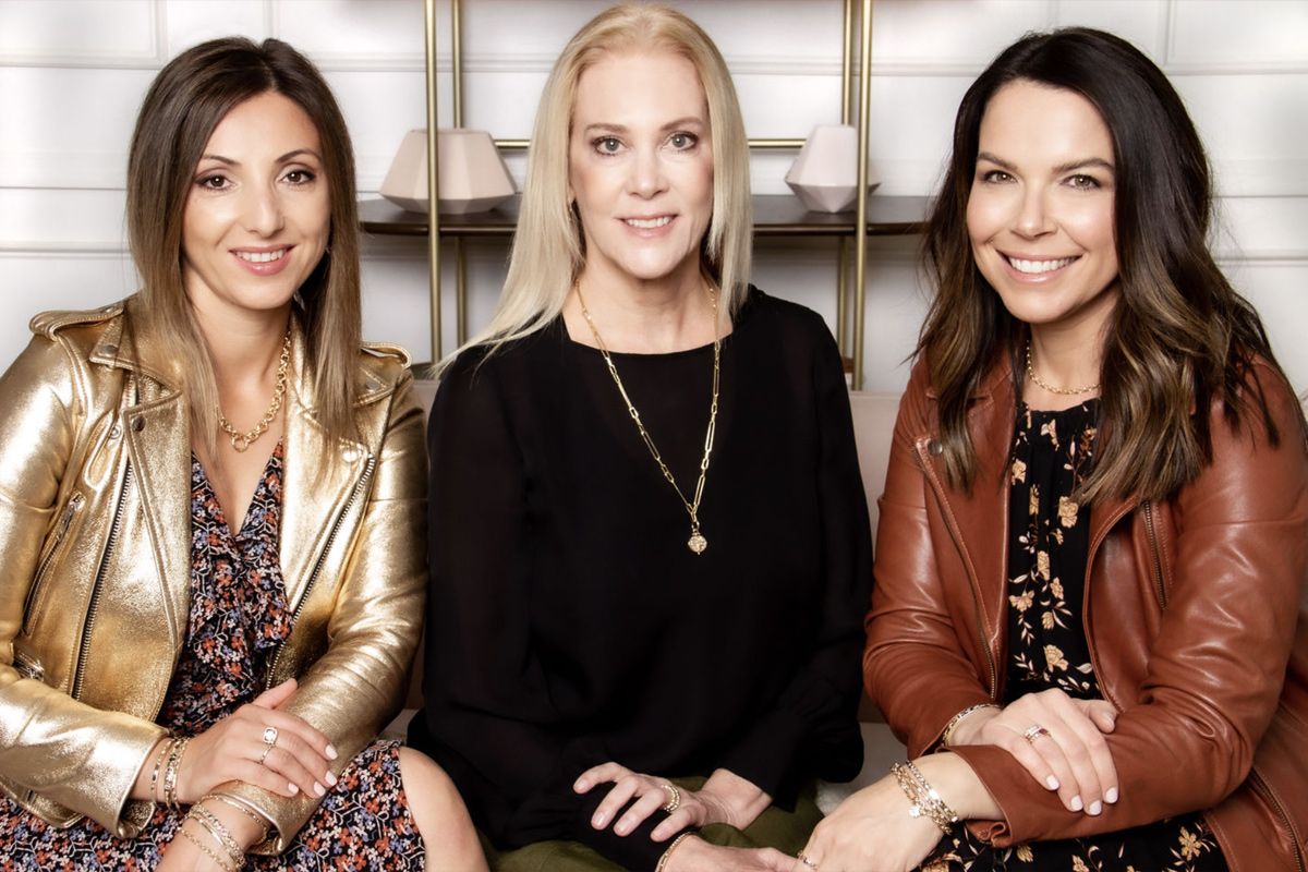 Company Branding Portrait Three Stories Jewelry Three Business Women sitting together and smiling