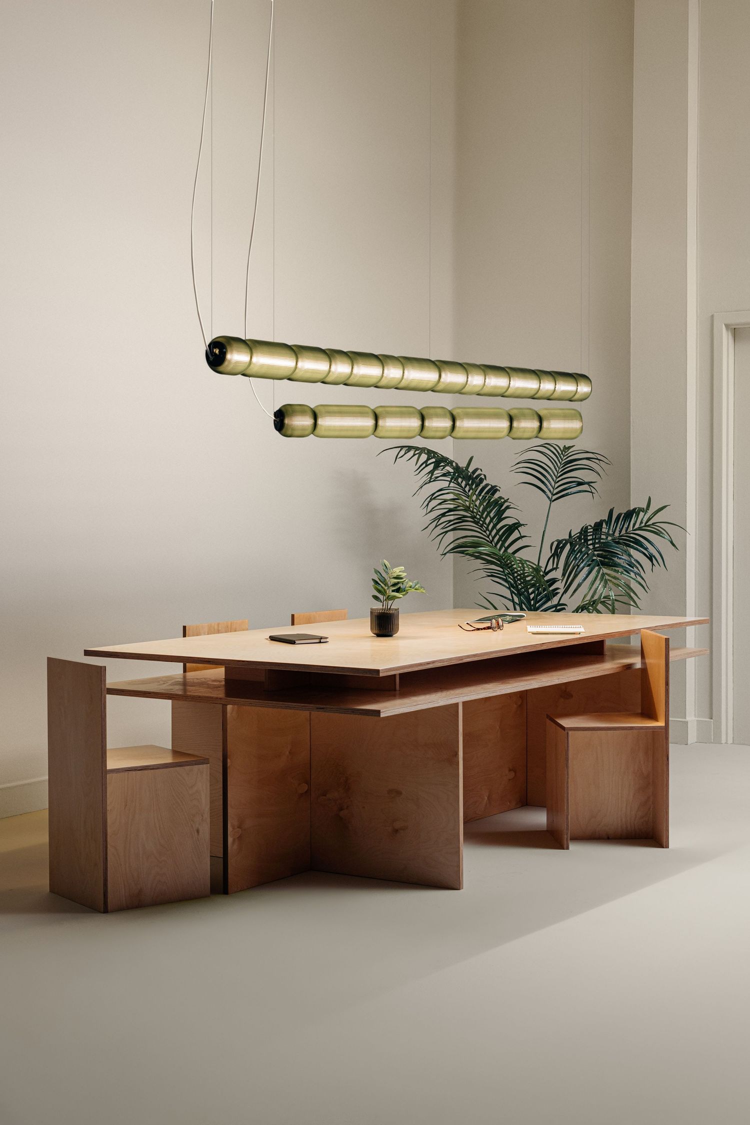Modern wooden modular bench with integrated lighting and minimalist design showcases clean lines in a neutral interior space.