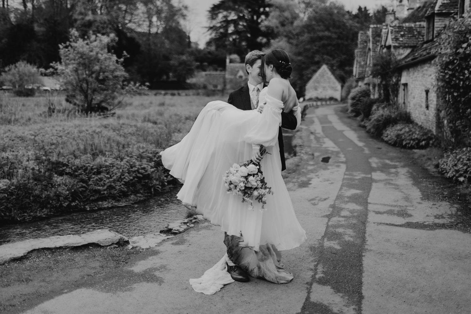 Romantic wedding photography session in rustic outdoor garden setting.