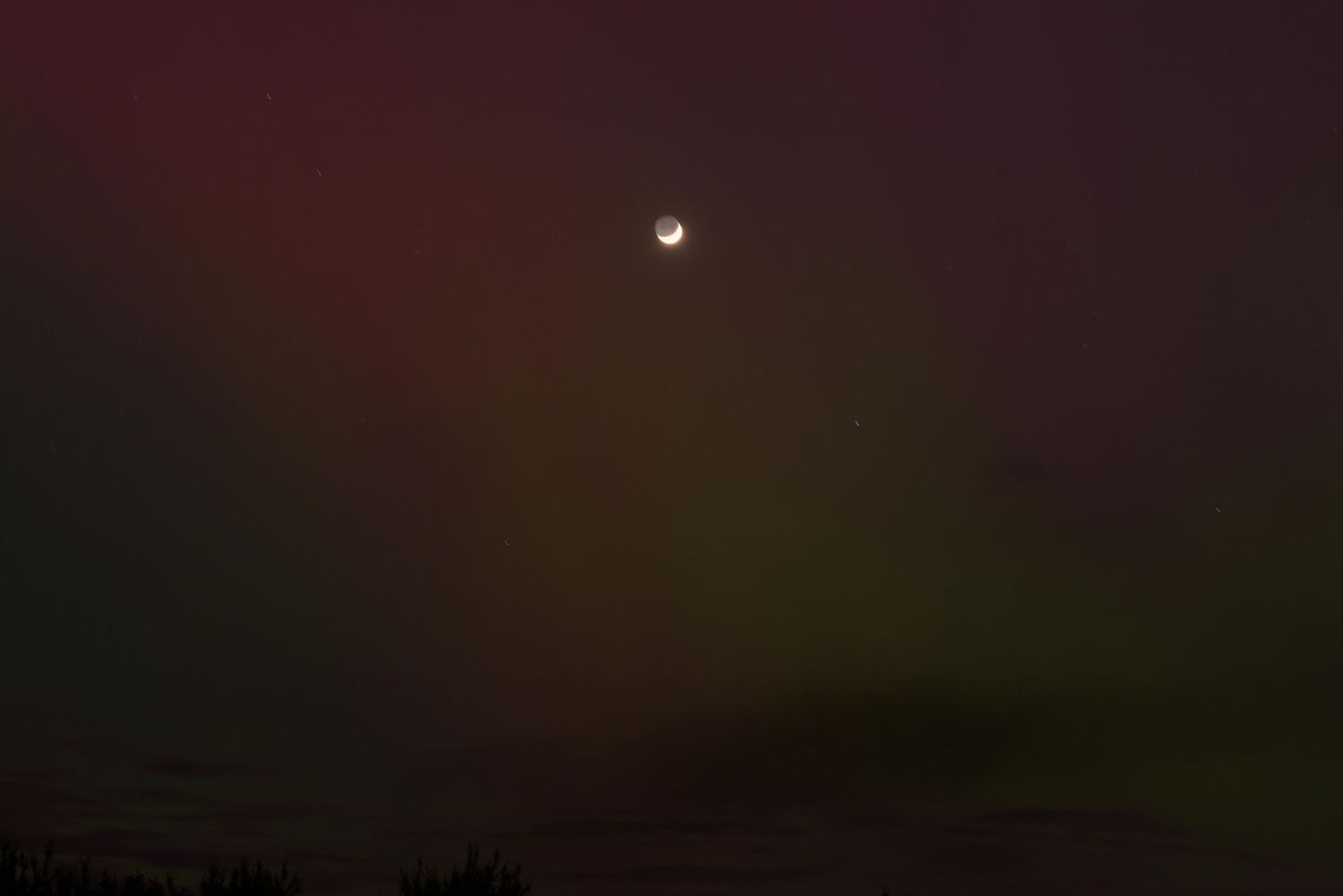 This image shows the sky transitioning to more reddish purple hues.