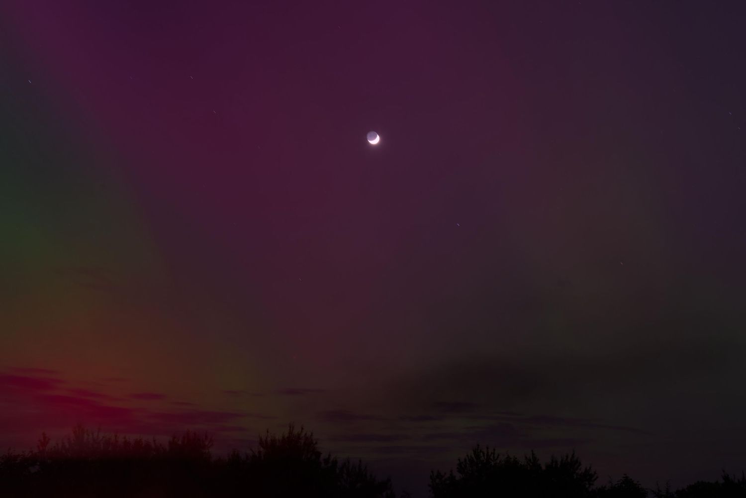 Purple, green, and red hues of the northern lights begin to appear in full force in Ohio!