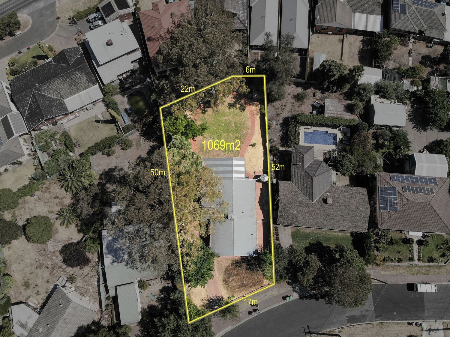 Birds‑eye drone view over house