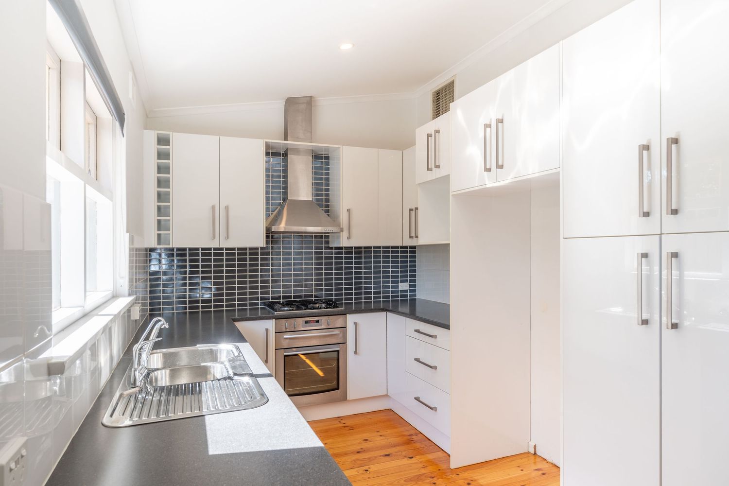 Modern kitchen interior with clean lines and contemporary finishes.