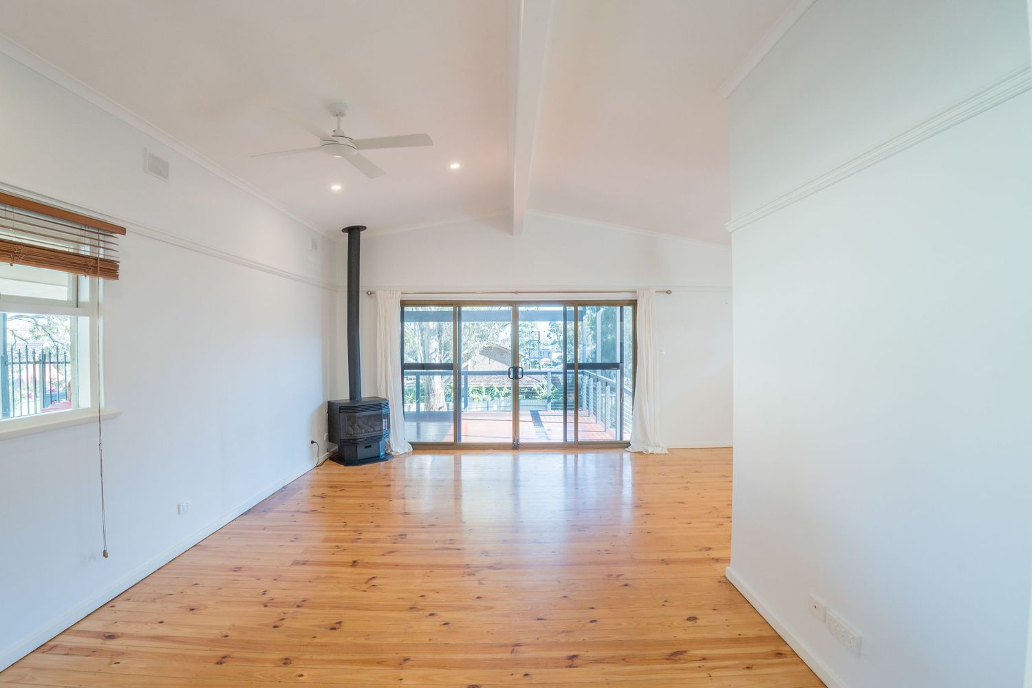 Open‑plan lounge and dining area with modern furnishings.