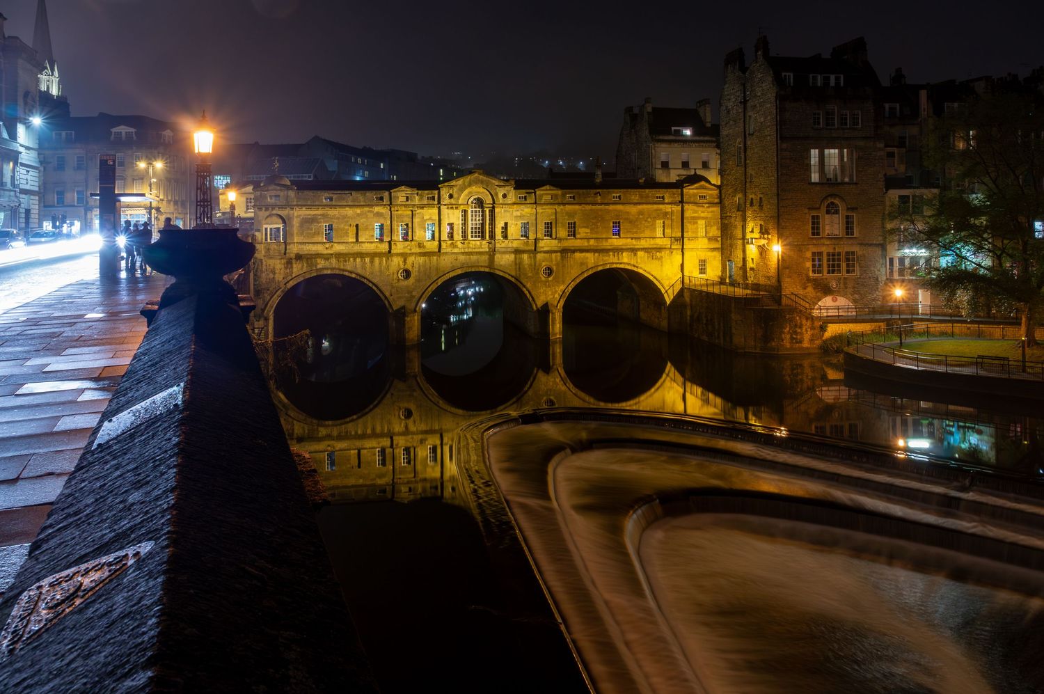 Pulteney Bridge in Bath with historic stone architecture over the river.