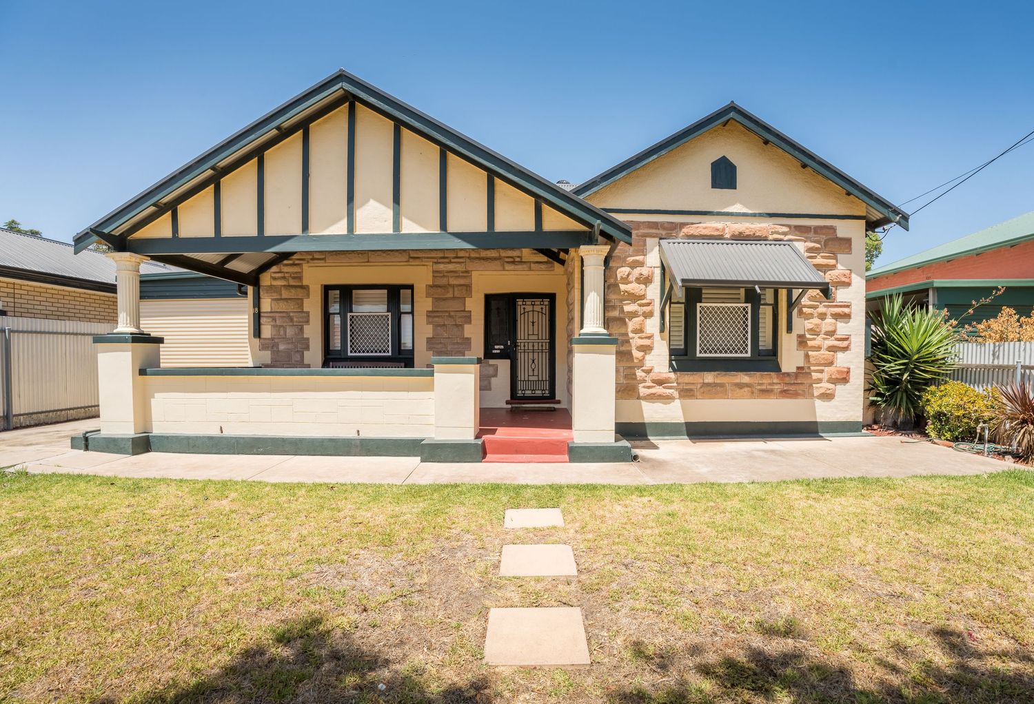 Front exterior of a character home with clean architectural lines.