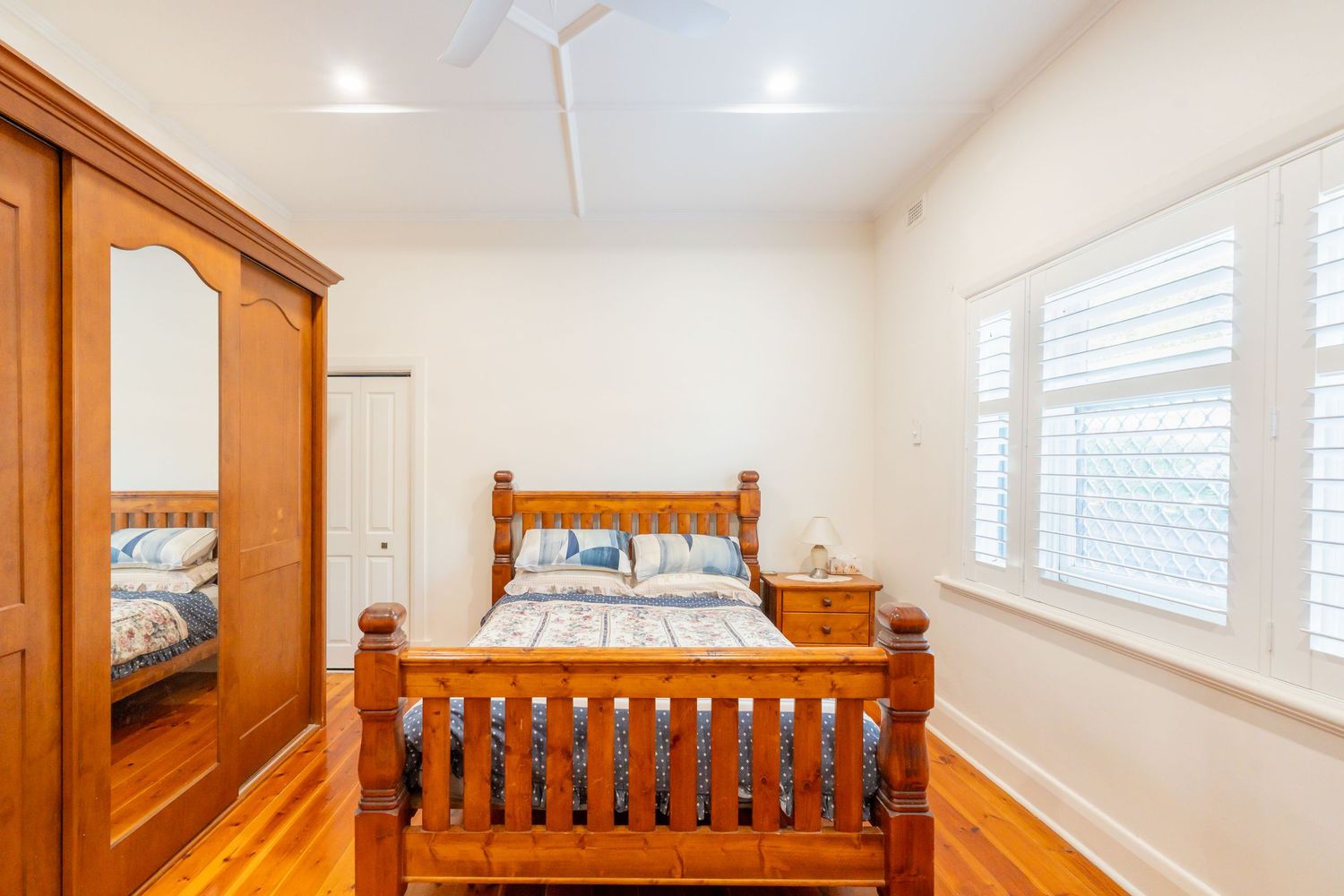 Styled main bedroom with soft lighting and modern décor.