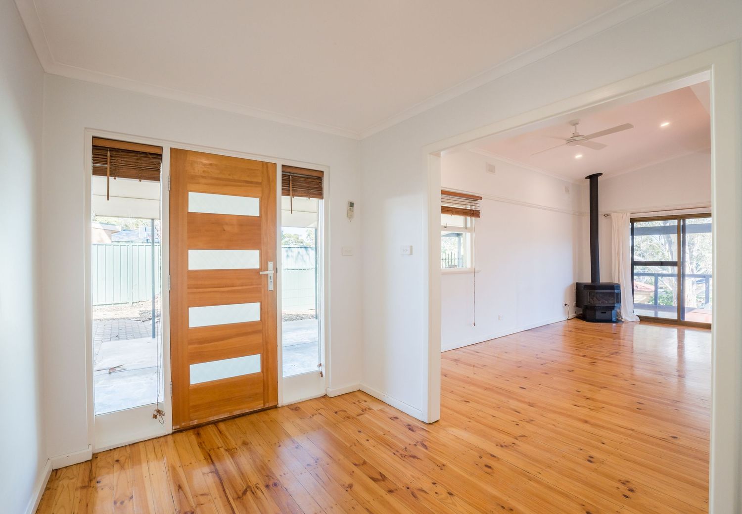Open‑plan lounge and dining area with modern furnishings.