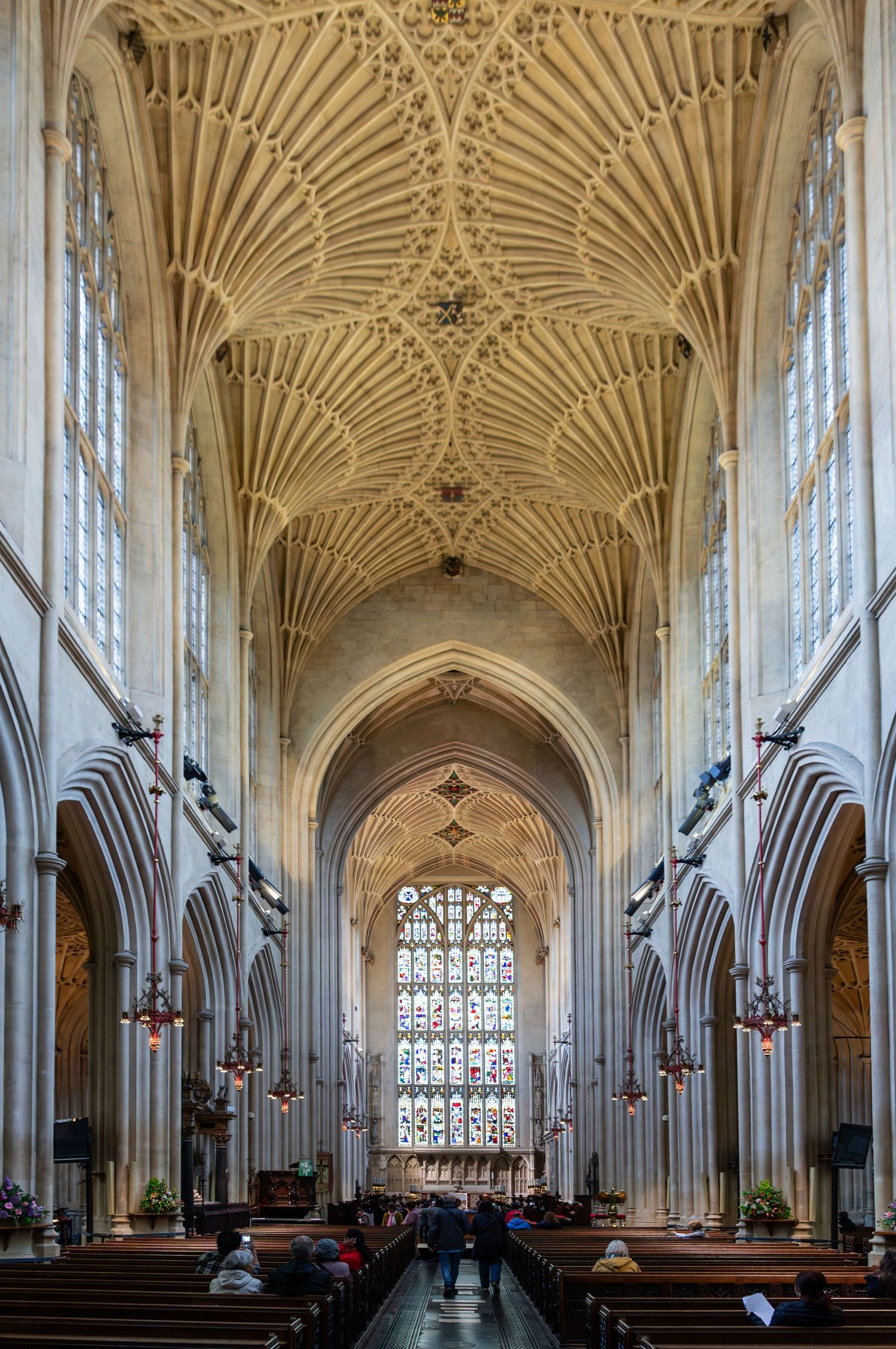 Interior of Bath Abbey showing arches and stone craftsmanship.