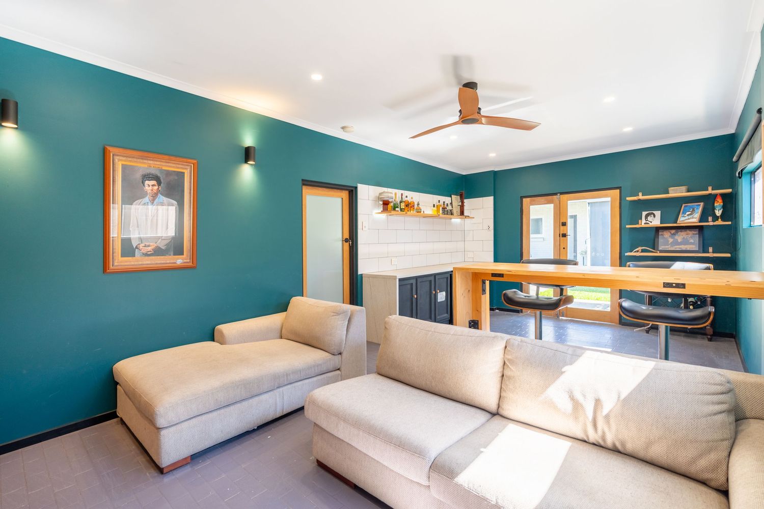 Rumpus room with bar area and relaxed entertainment layout.