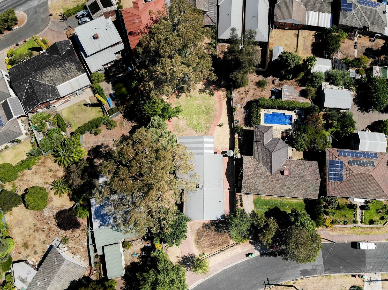 Birds‑eye drone view over house