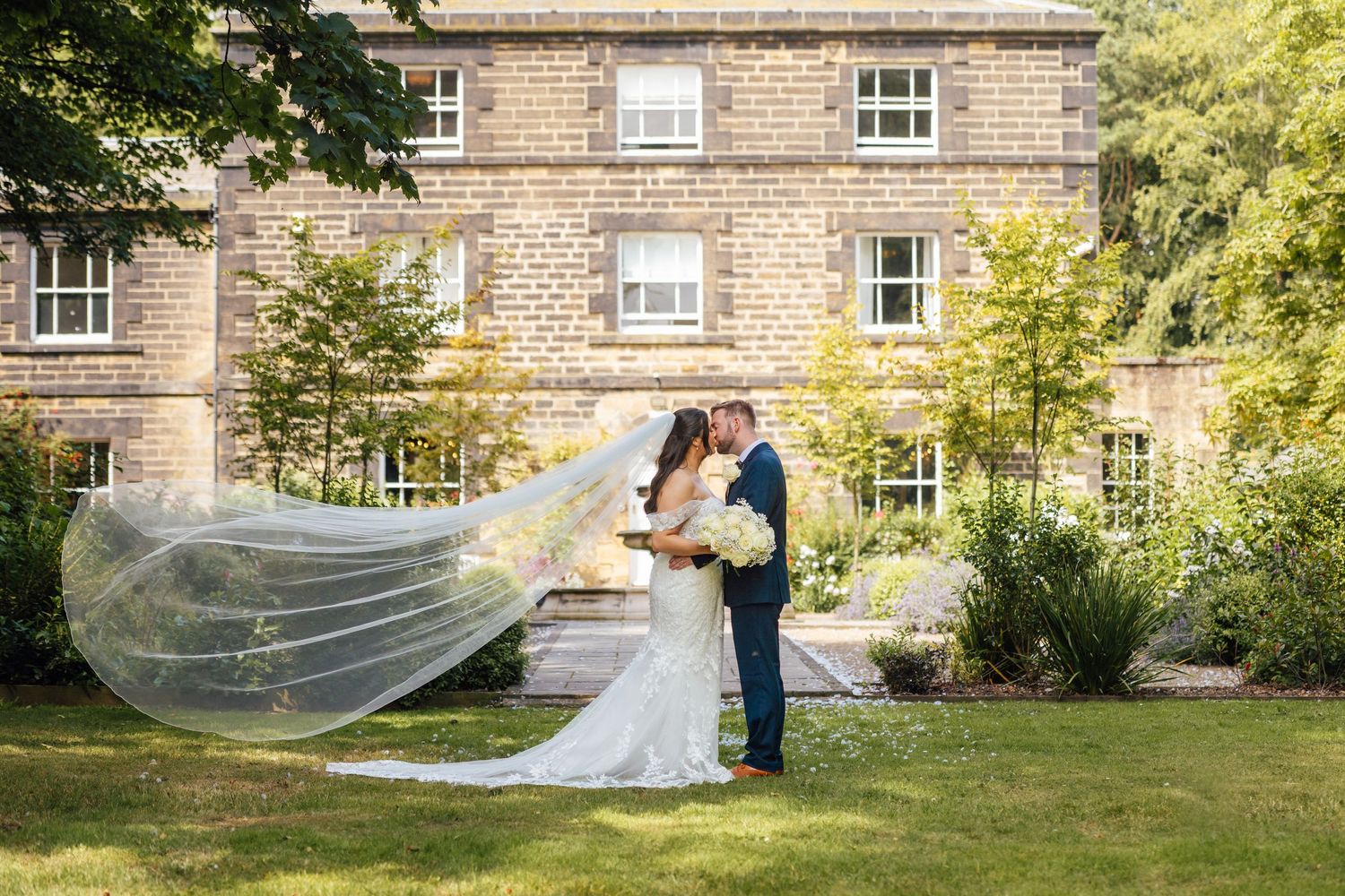 Relaxed wedding portrait of a bride and groom at Shotton Grange by a North East documentary wedding photographer