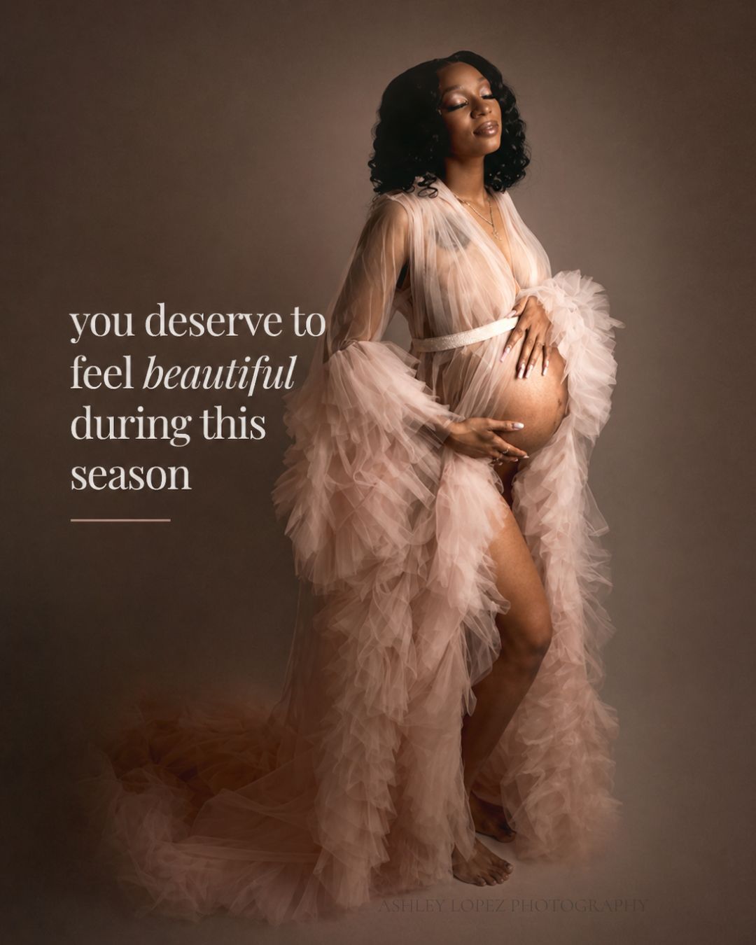 Kansas City maternity photographer studio portrait with dramatic lighting and flowing gown