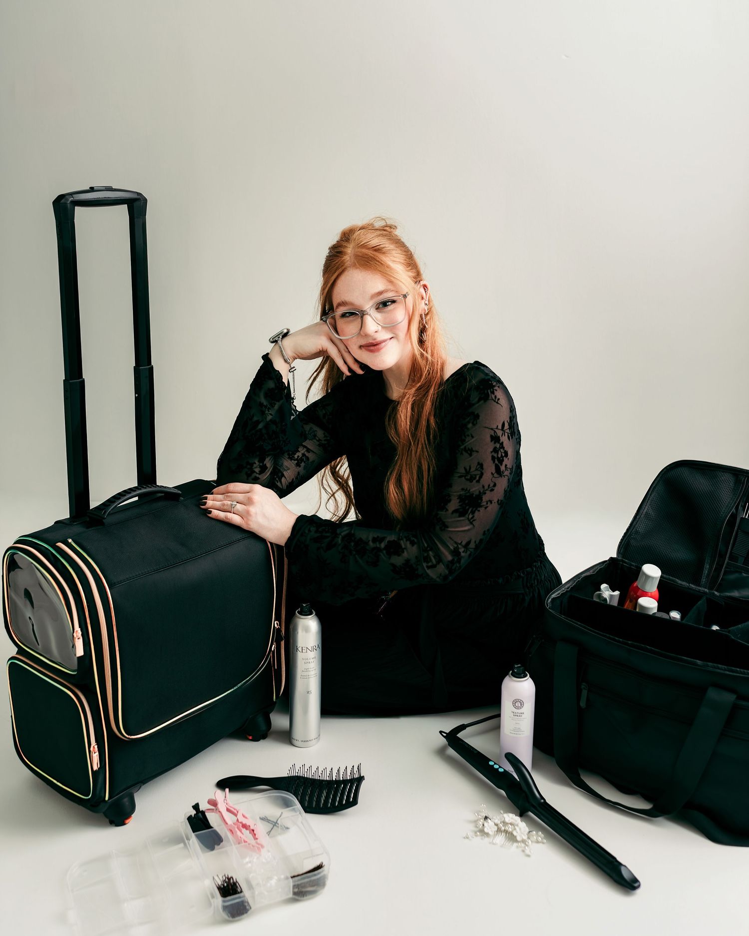 Kansas City bridal hairstylist branding session featuring a hairstylist with her travel kit, styling tools, and beauty products