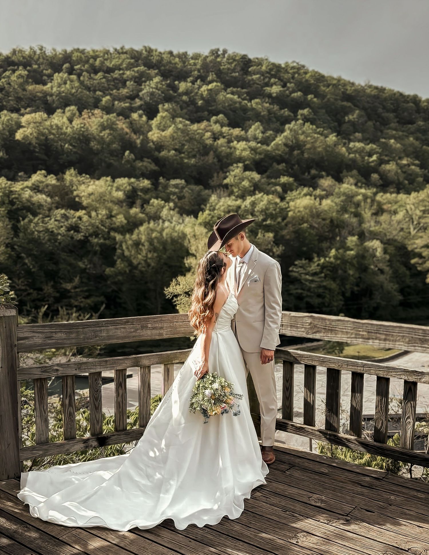 Romantic wedding portrait overlooking Roaring River State Park in Missouri