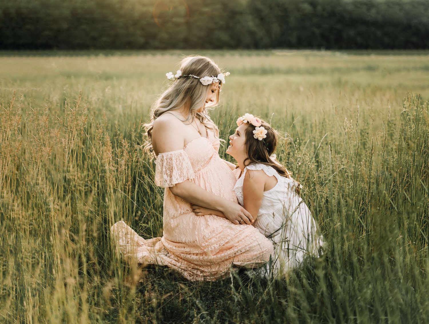 Mother with children during outdoor maternity session Kansas City photographer