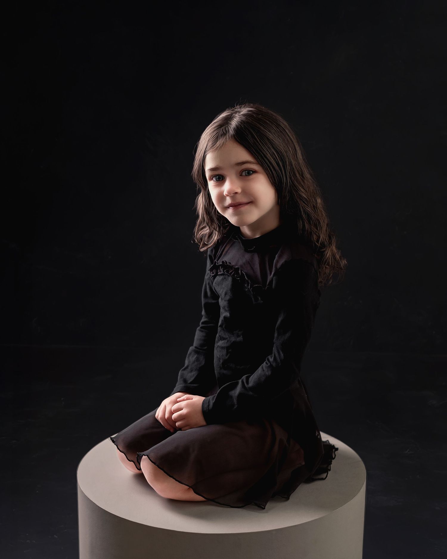 Fine art children's portrait of a young girl sitting on a white pedestal in a photography studio in Kansas City, Missouri