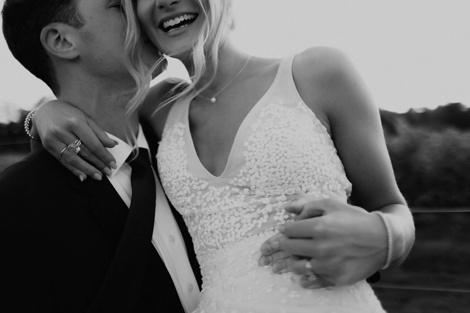 Black and white intimate wedding portraits showing joyful candid moments in Connecticut.