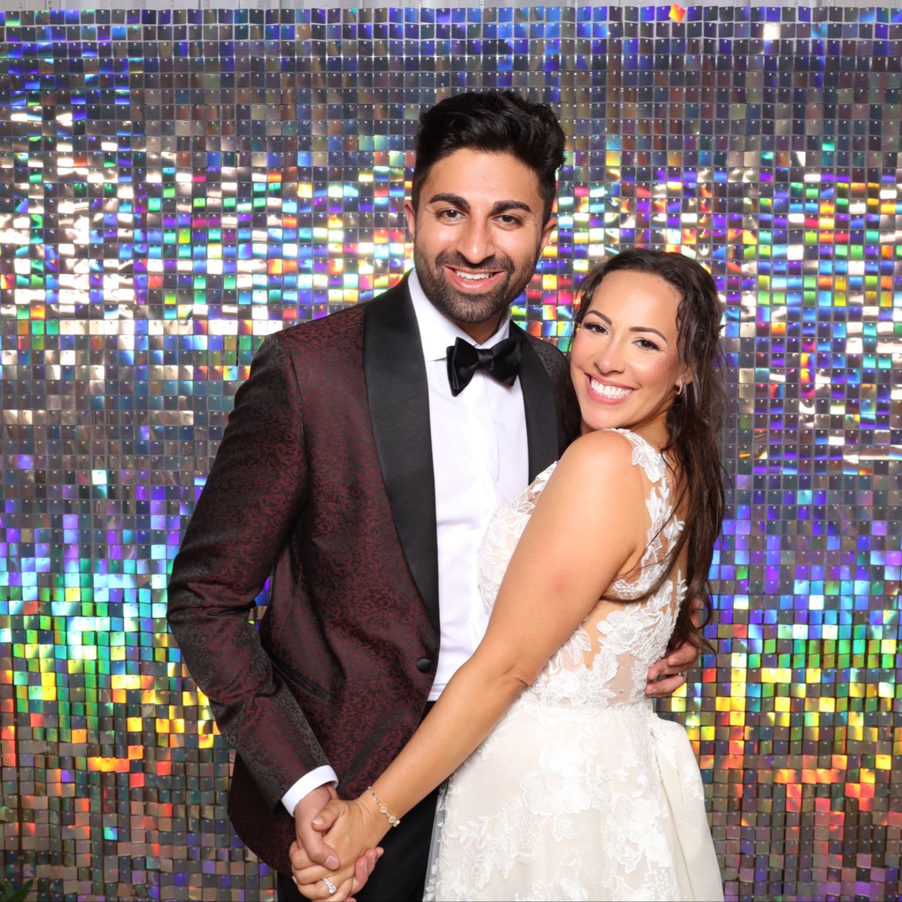 Bride and Groom with Iridescent Shimmer Wall for Wedding Photo Booth at The Belvedere Hotel in Baltimore