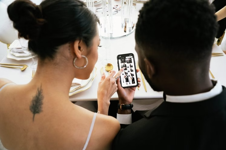 Couple reviewing online gallery at Wedding in Annapolis