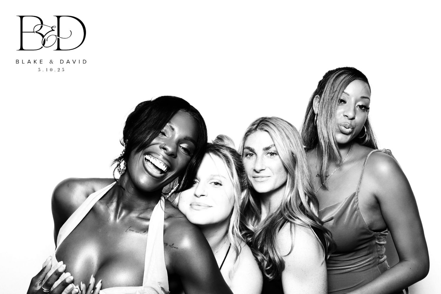 Four guests posing in Glam Booth