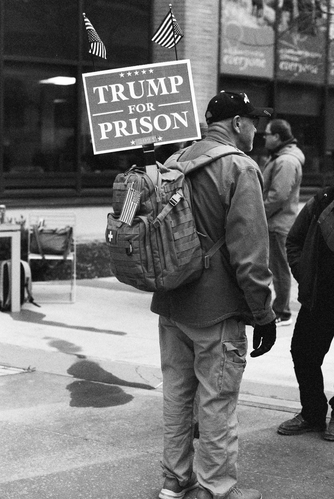 Trump for prison protester. Boise, Idaho 2026. T-max 3200 Black and White 35mm film.