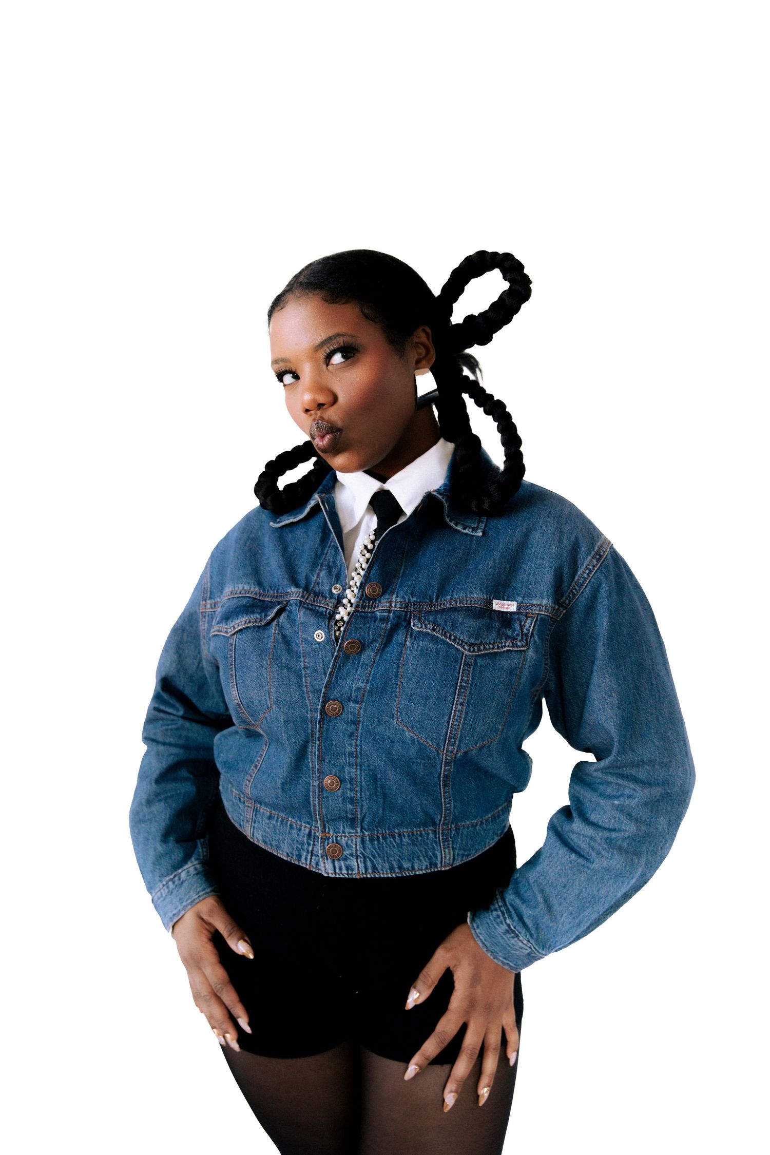 Three fashion poses in denim jacket and black pants showcase casual urban style against white background.