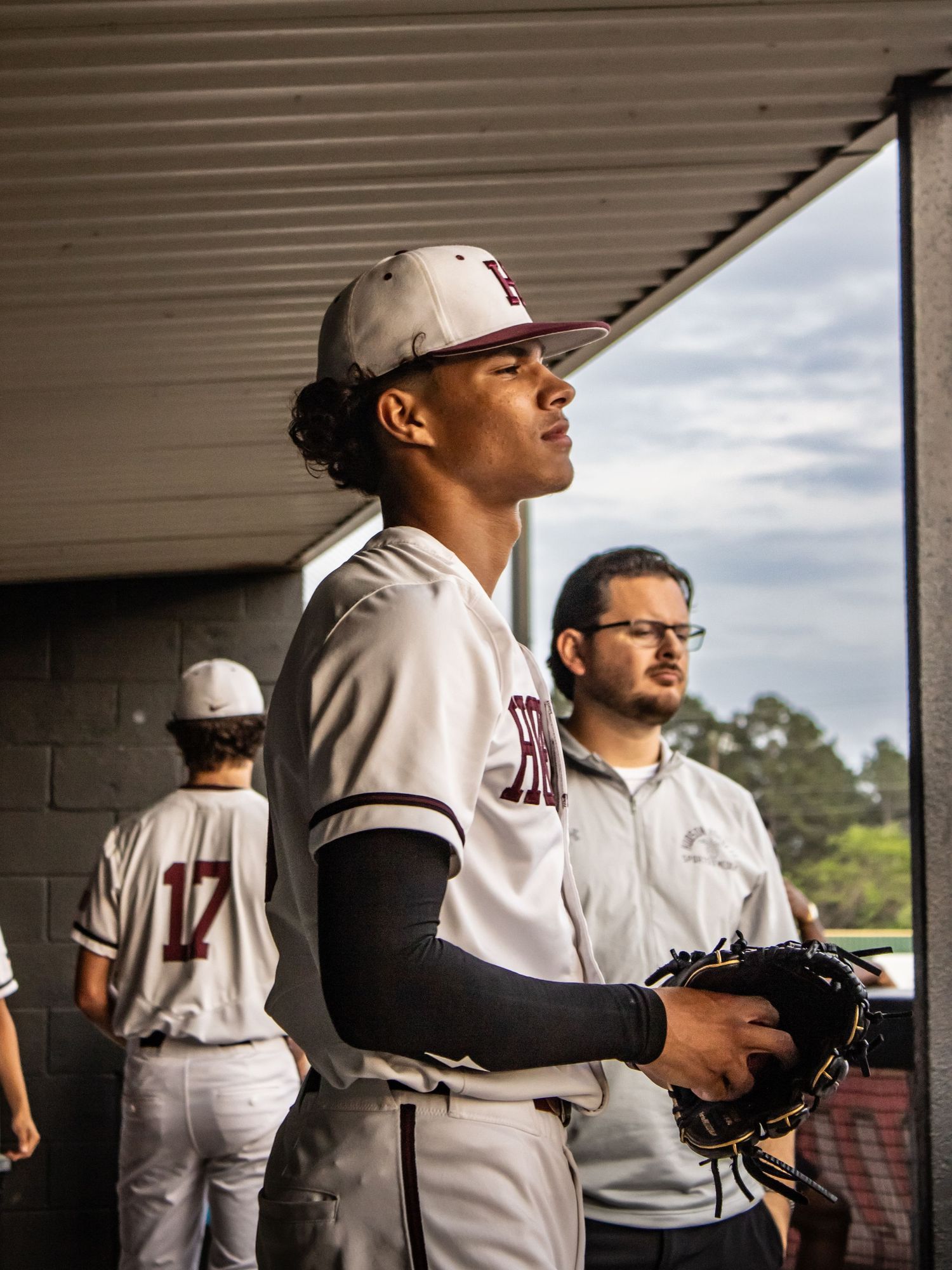 A photo made by shotz.by.jah of an athlete (baseball player) stares out into the field of play