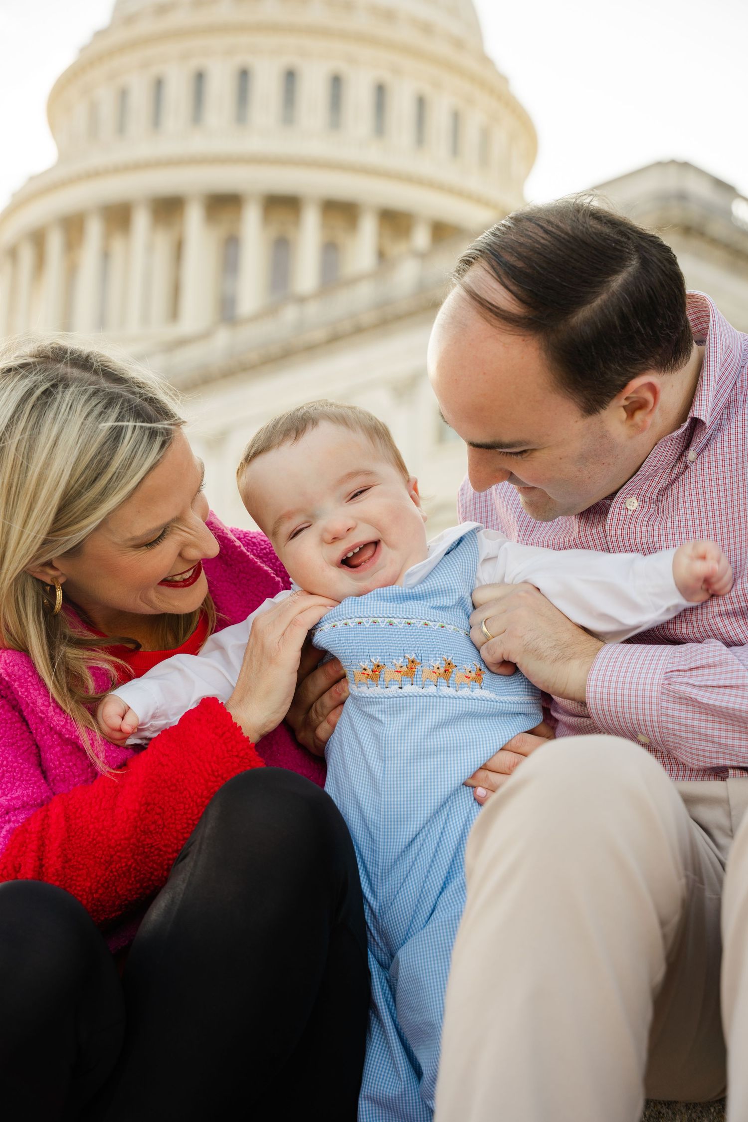 Family portrait series shows candid moments of affection and laughter against a blurred Capitol building background.