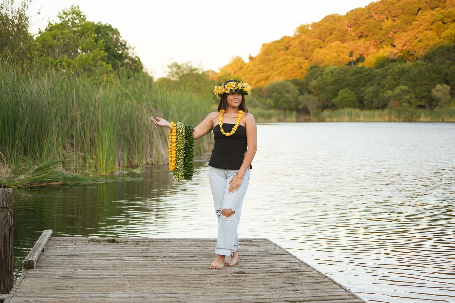 Dallynn modeling a customized yellow lei lineup
