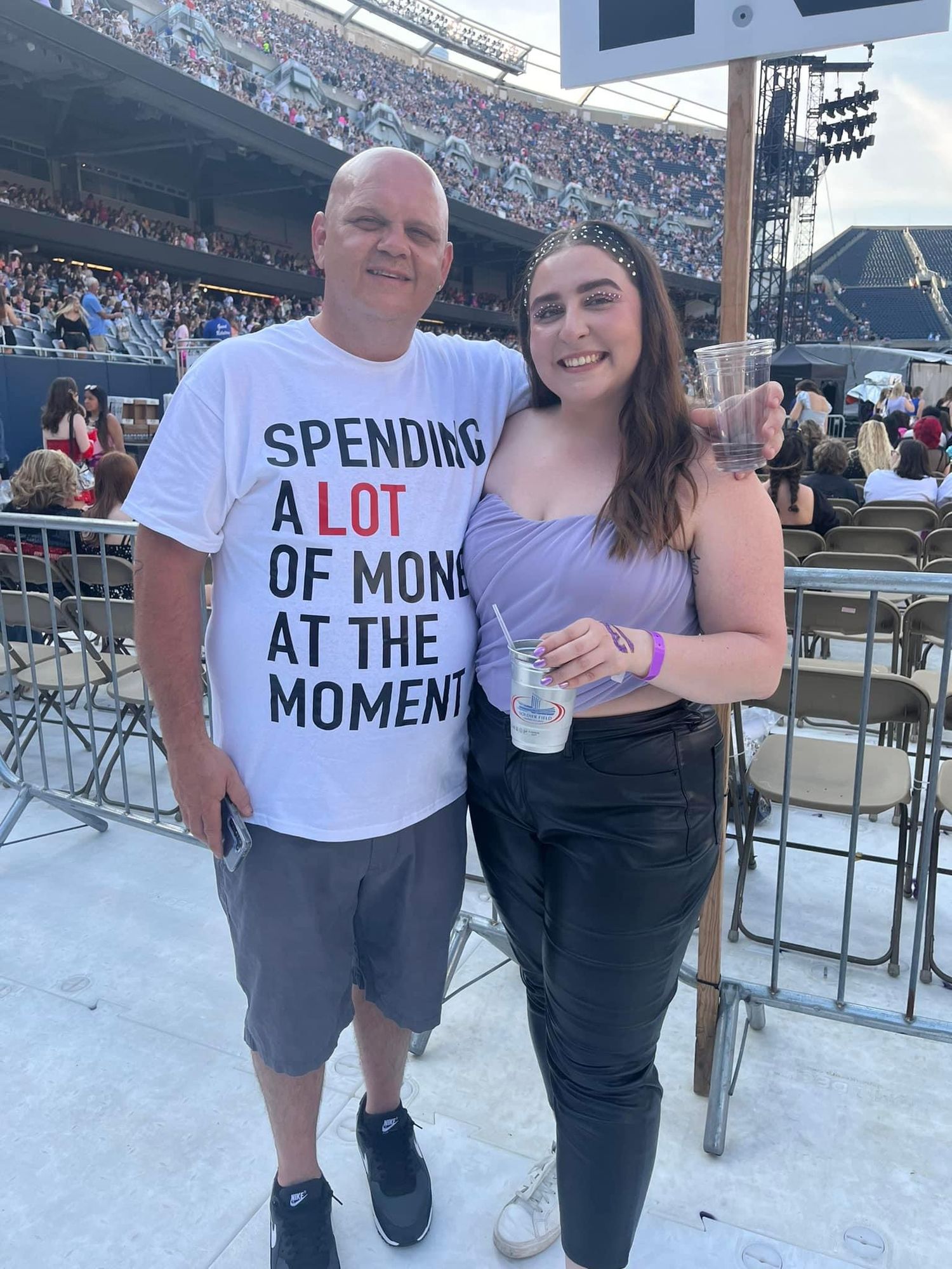 Father and daughter at Taylor Swift's Eras Tour.
