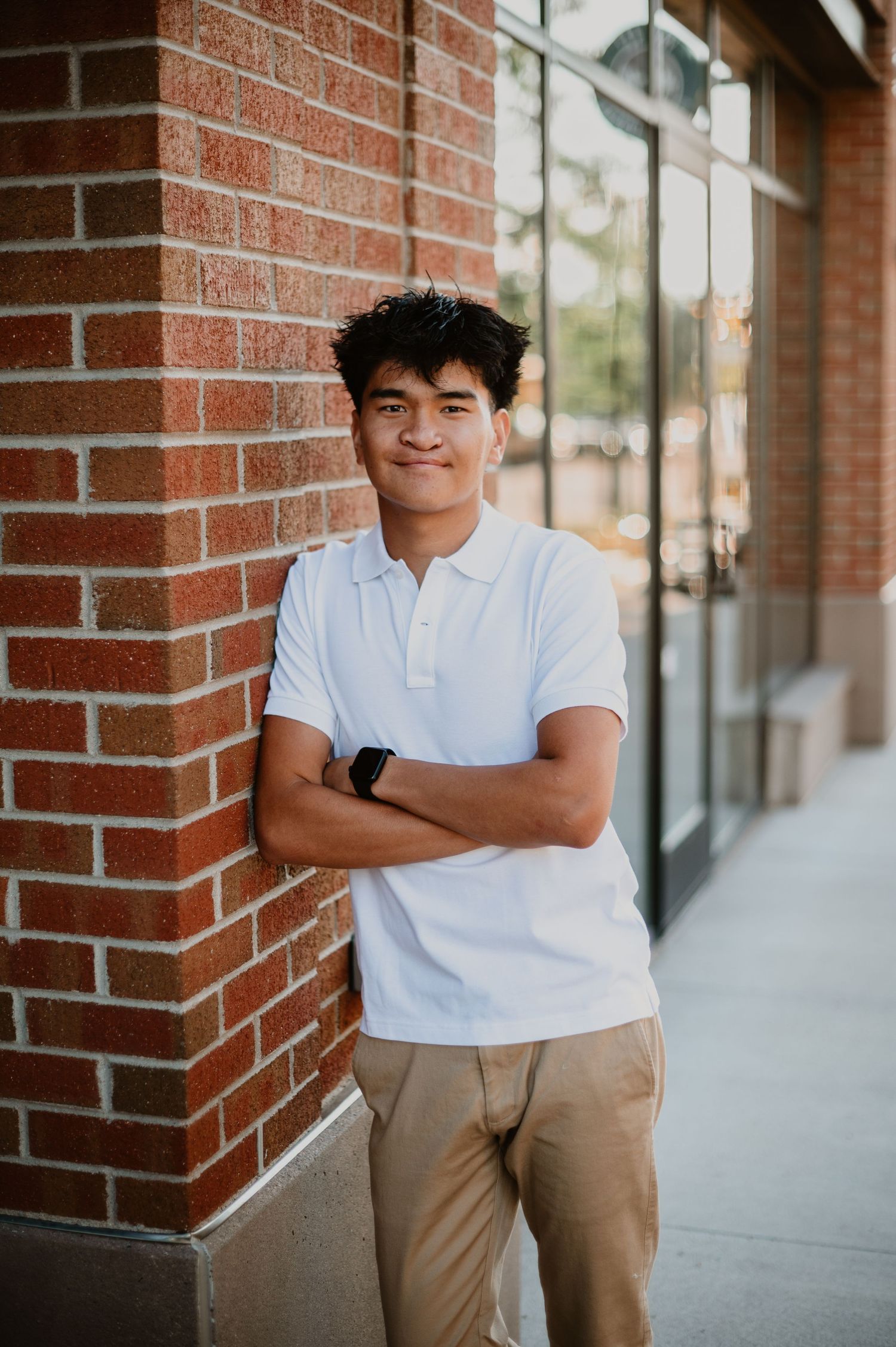 Confident senior guy stands tall against Colorado’s stunning backdrop, ready to take on the future with a bold, adventurous spirit.