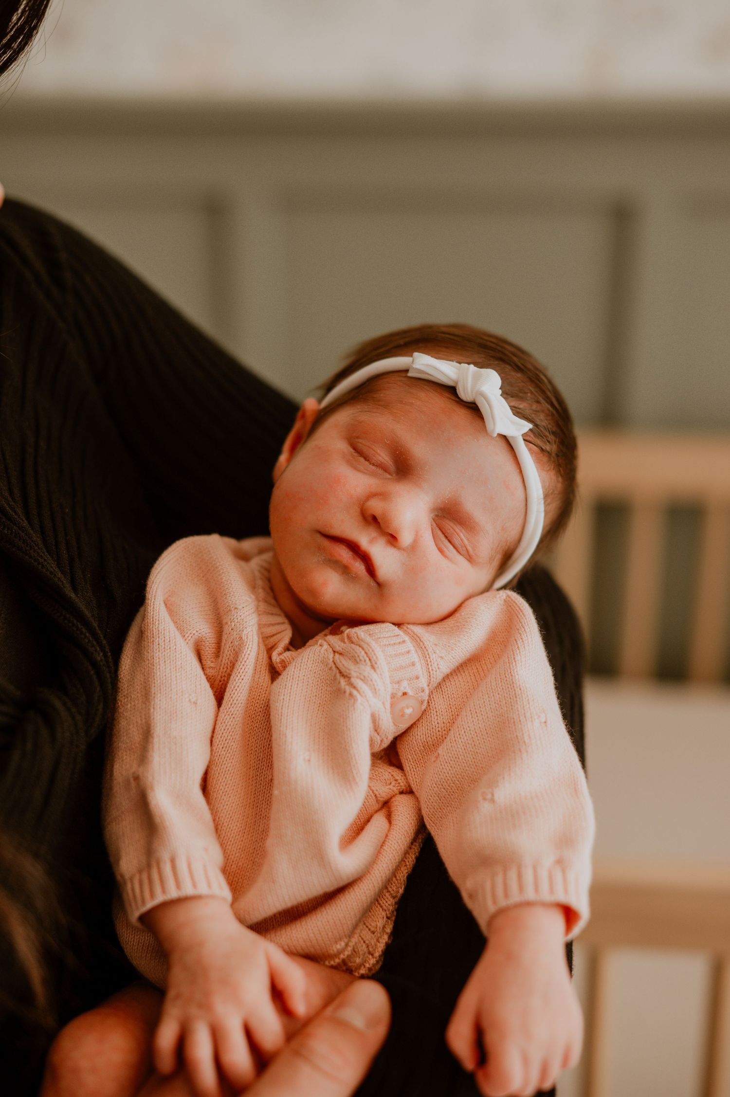 A cozy in-home newborn session in Denver, capturing the tender moments between parents and their precious little one. Soft, natural light fi