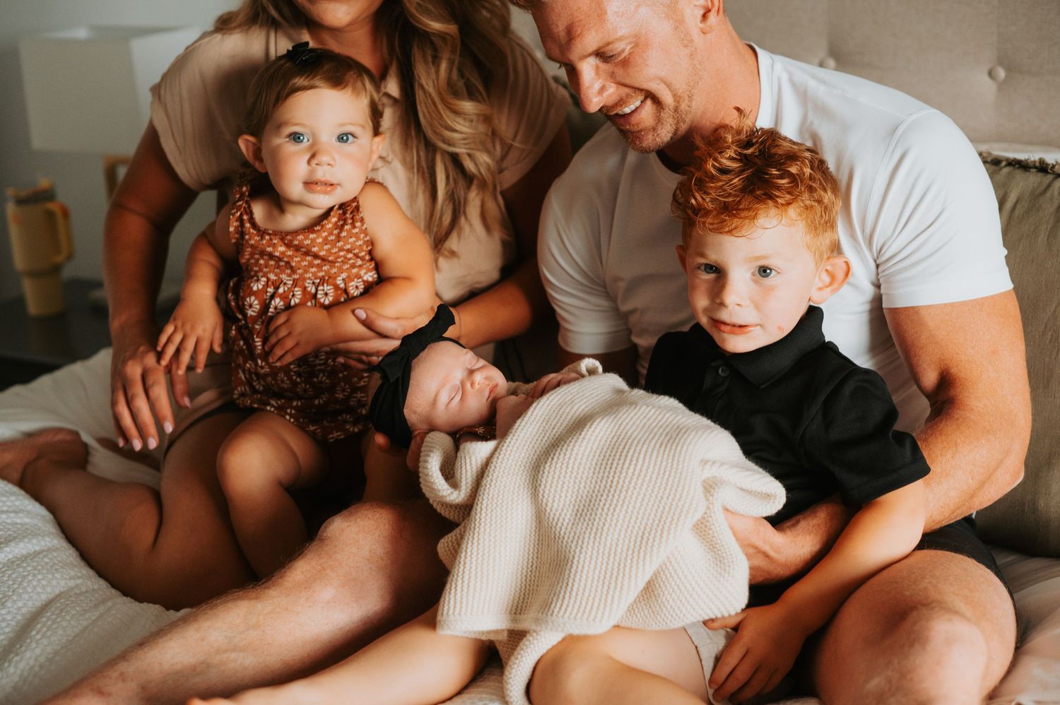 Newborn peacefully resting at home, wrapped in warmth and love—capturing the quiet beauty of these first precious moments