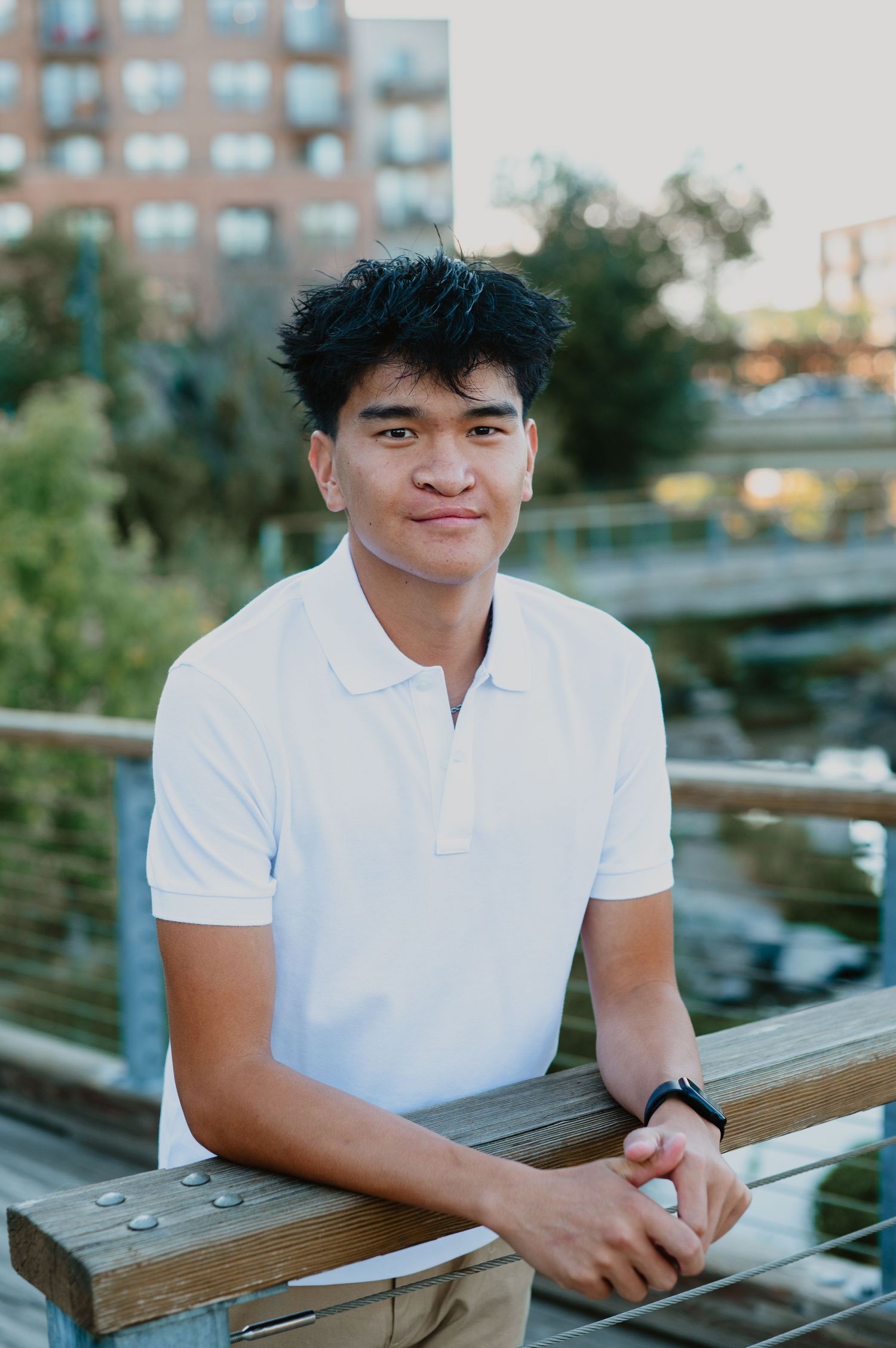 Confident senior guy stands tall against Colorado’s stunning backdrop, ready to take on the future with a bold, adventurous spirit.