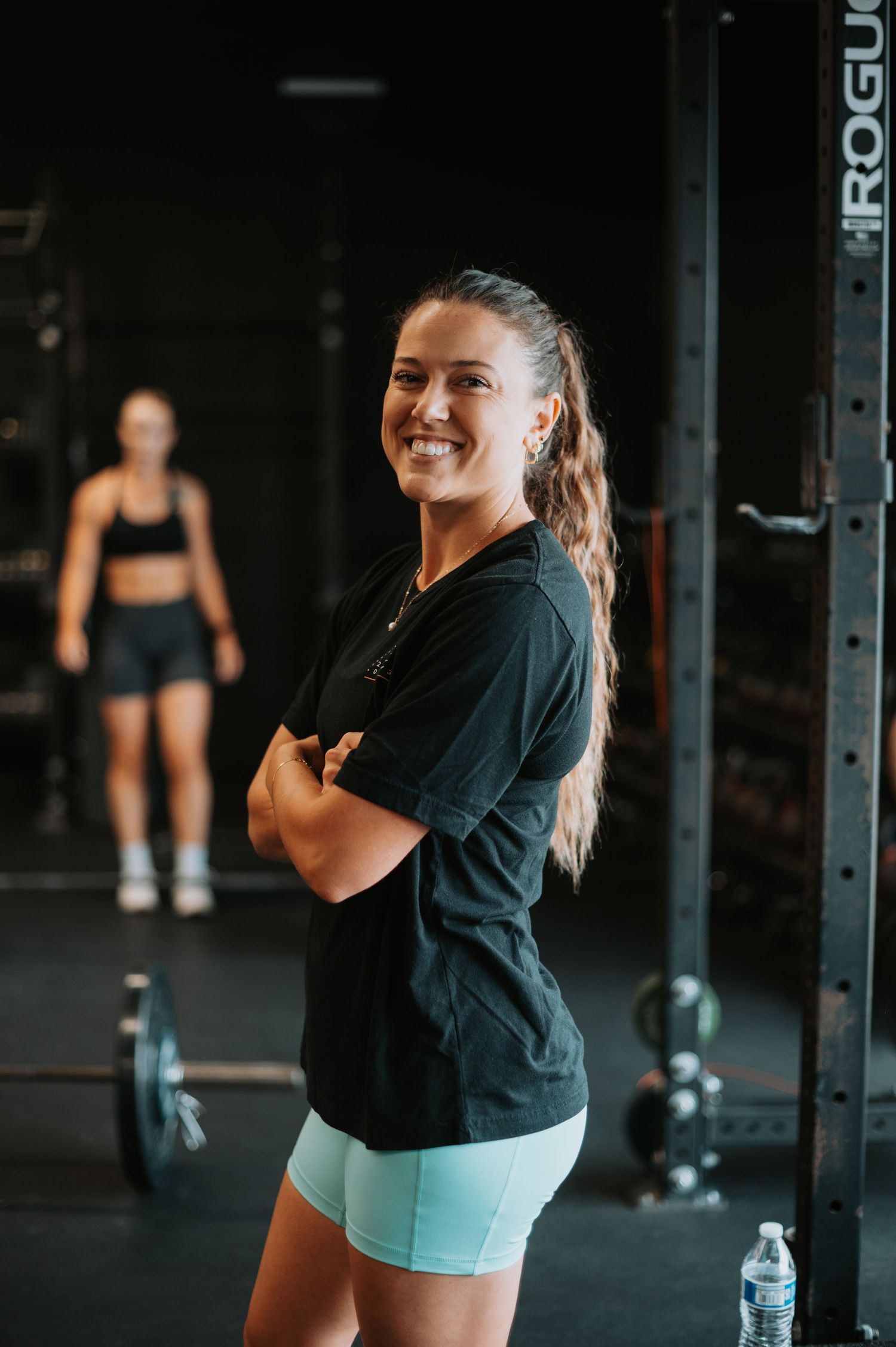 Strong and confident, a branding shot of a girl in the gym, showcasing empowerment and passion for fitness in a dynamic, inspiring setting.