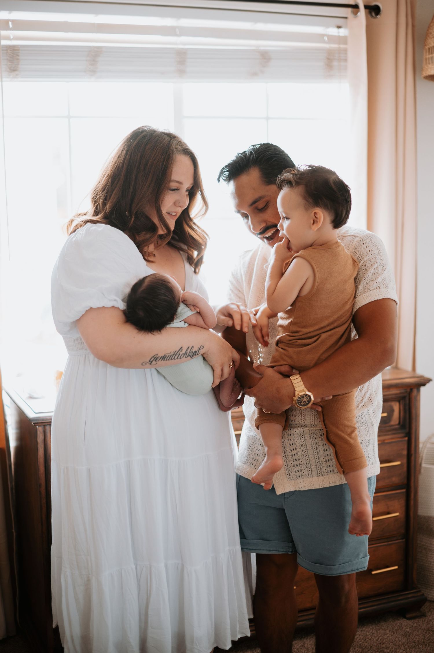 Sweet newborn snuggled in the warmth of home, capturing peaceful moments and the pure joy of new parenthood in a cozy, intimate setting