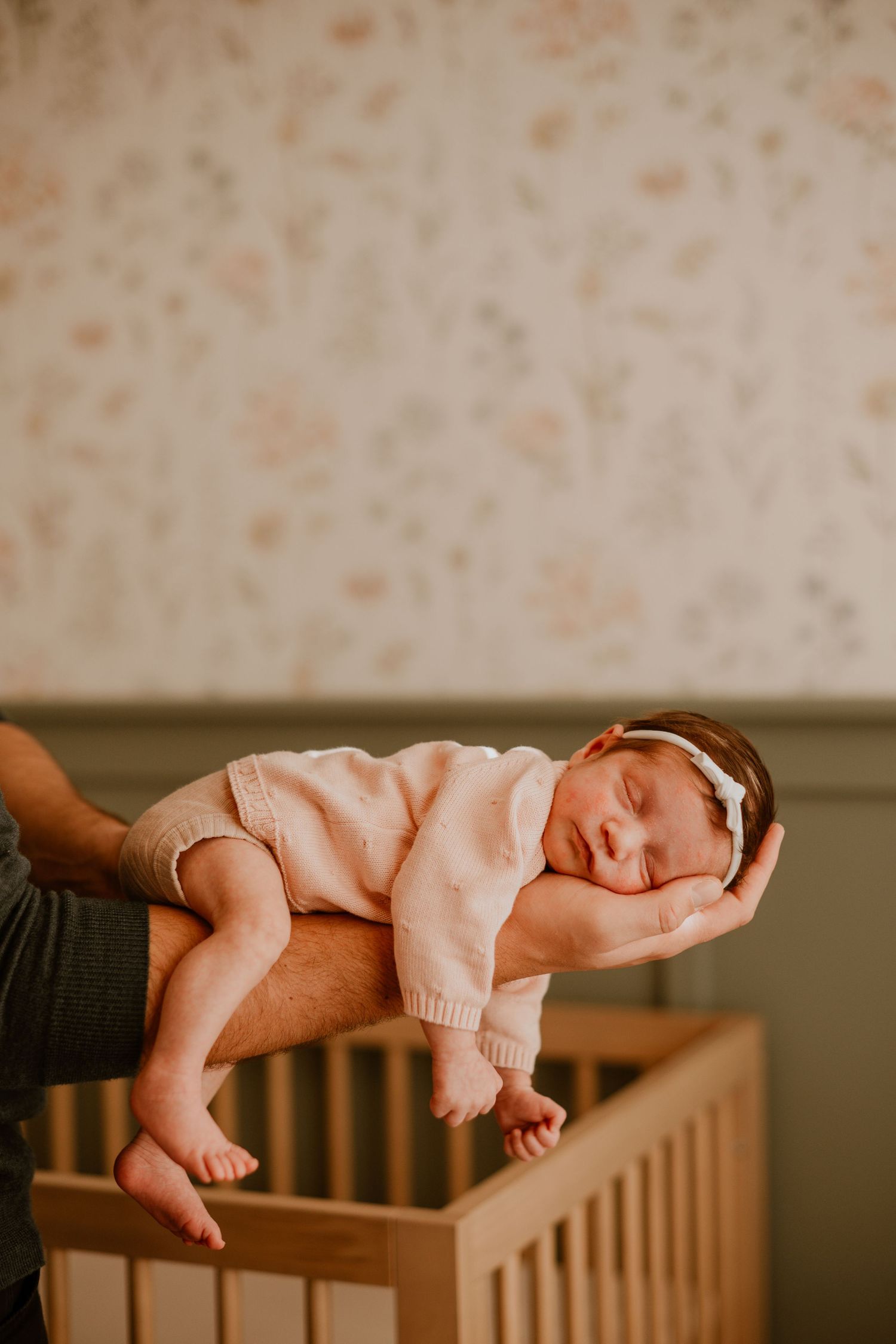 A cozy in-home newborn session in Denver, capturing the tender moments between parents and their precious little one. Soft, natural light fi