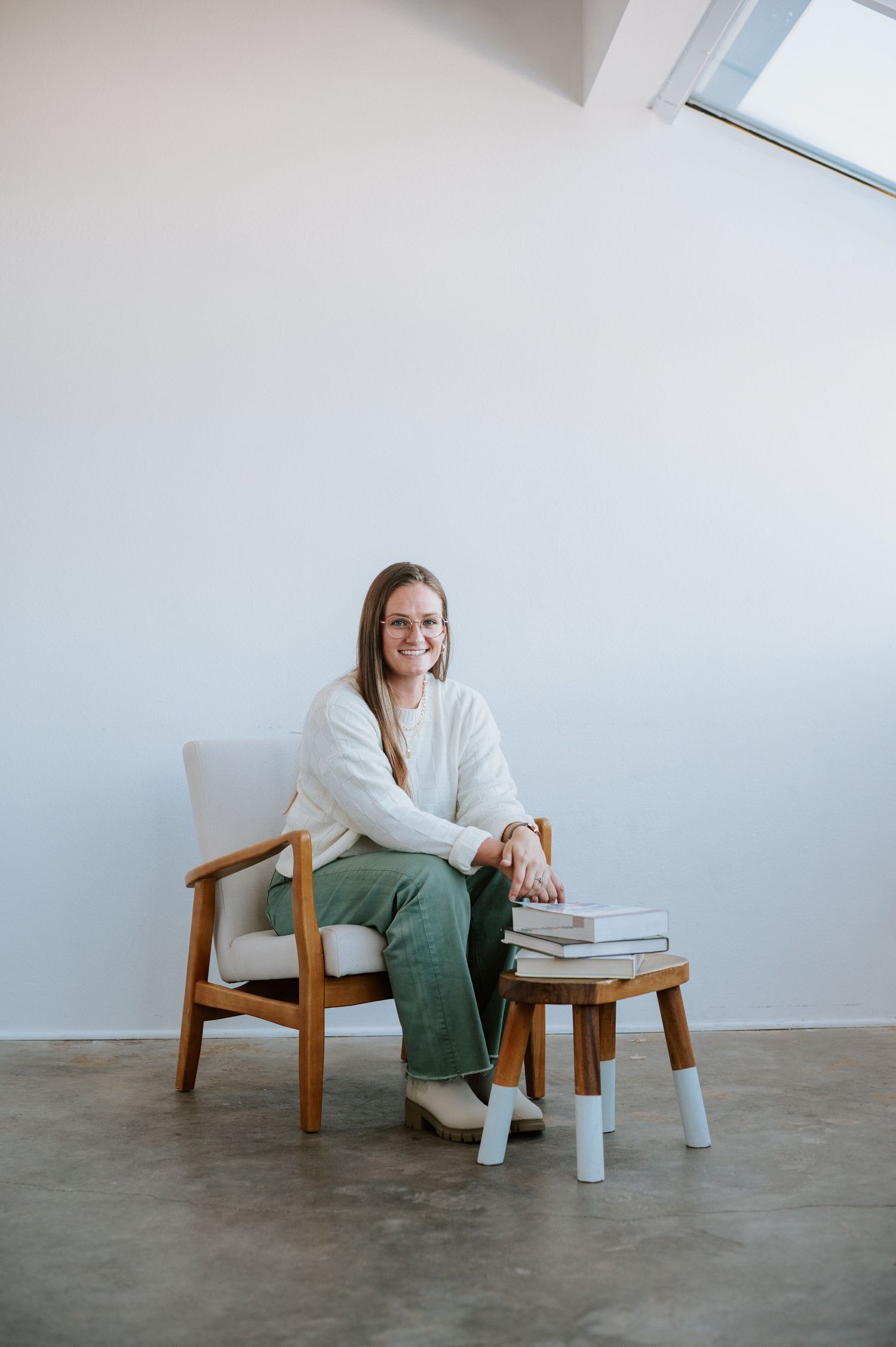 Professional headshot of a confident woman, showcasing her approachable yet powerful presence, perfect for elevating her business brand